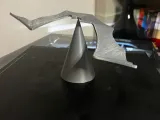 Balanced Bat standing on a tip stand-3