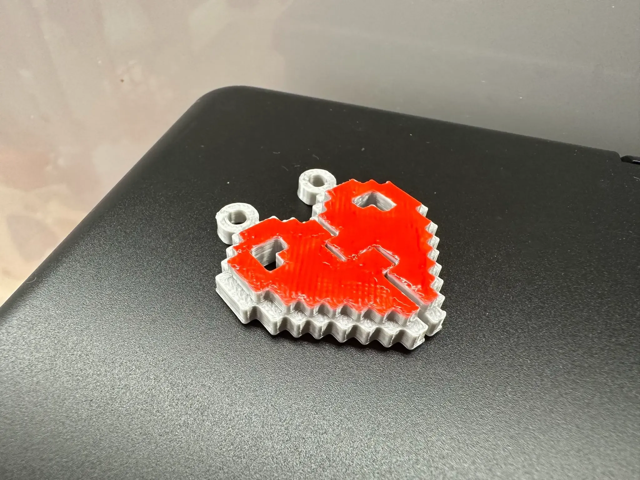 Paired pixel heart keychains