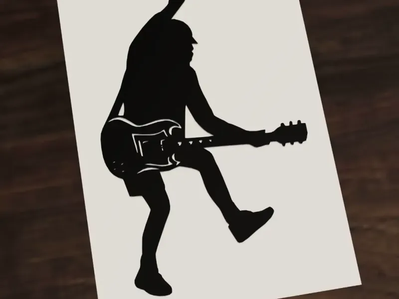 Angus Young playing guitar ACDC