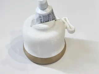 Dévidoir à dentifrice 