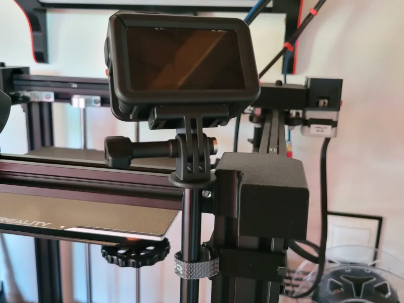 Holder for camera on printer