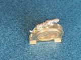 golden clock with 7750-6