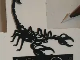 Portallaves de escorpion-0