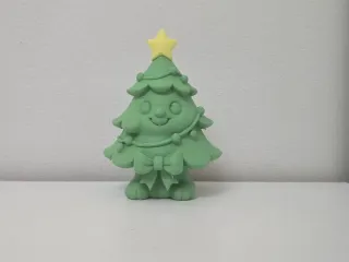 Smiling Tree with Star and Bow Christmas Figure