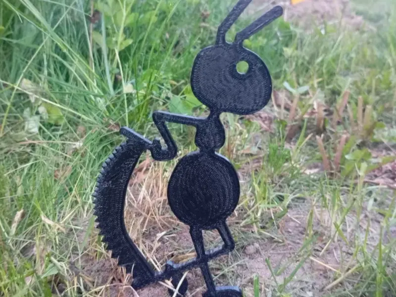 Garden figure of an ant with a saw