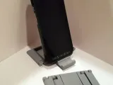 Parametric storage phone stand-0
