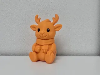 Sitting Reindeer with Cozy Scarf Holiday Figure