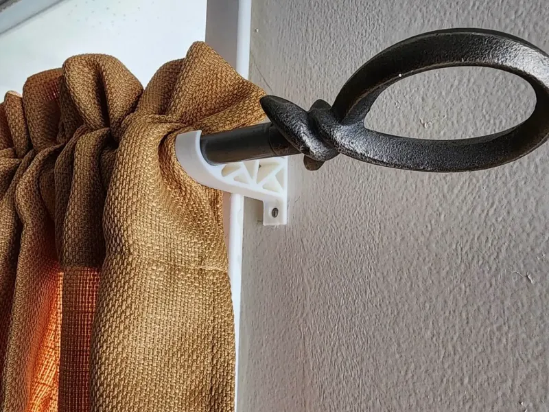 Curtain rod holder