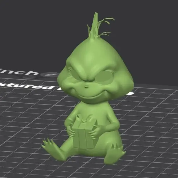 Baby Grinch sitting holding present, no CFS, eyes seperate