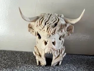 stone guardian highland cow
