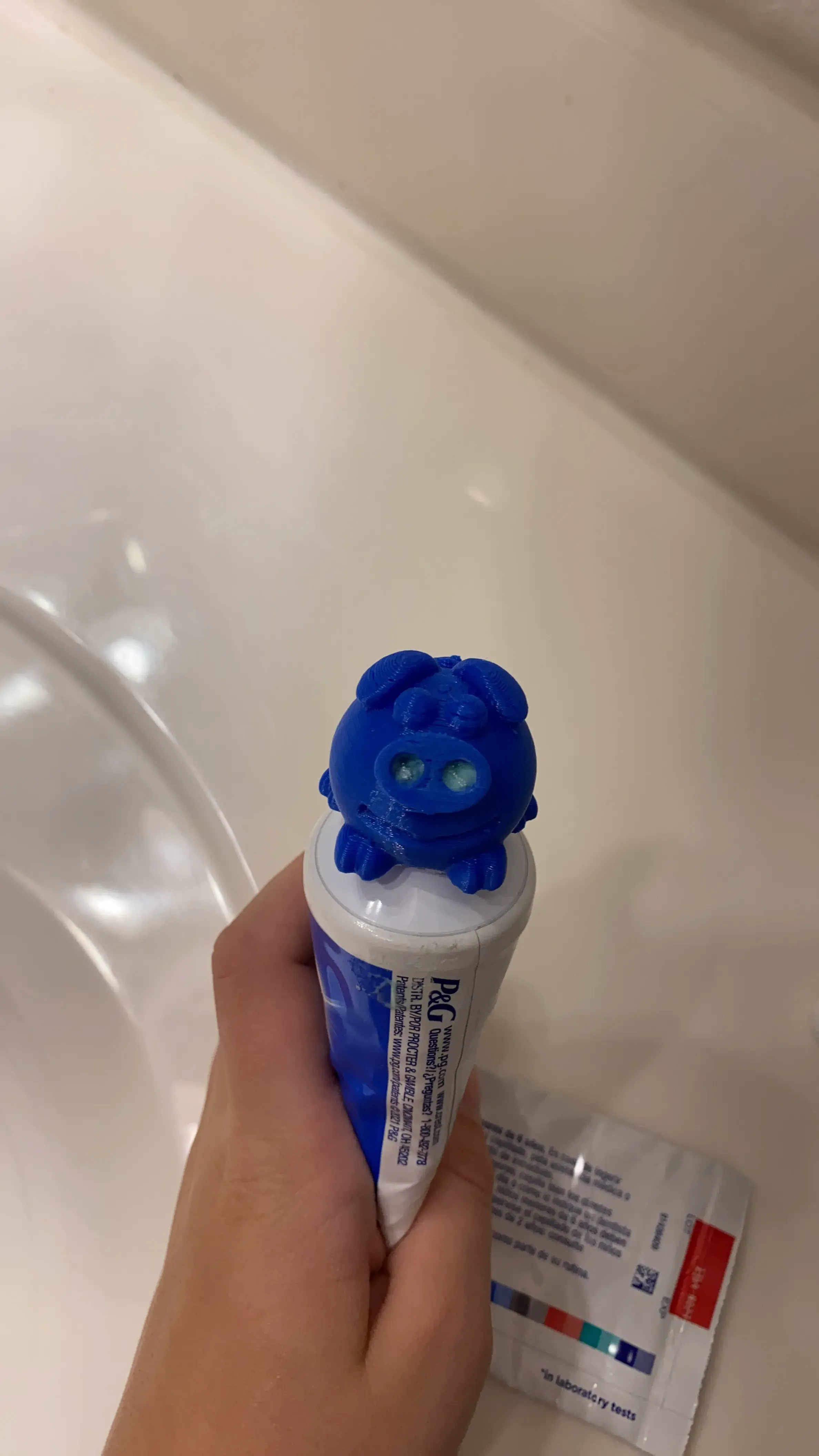 Toothpaste topper pig and plug