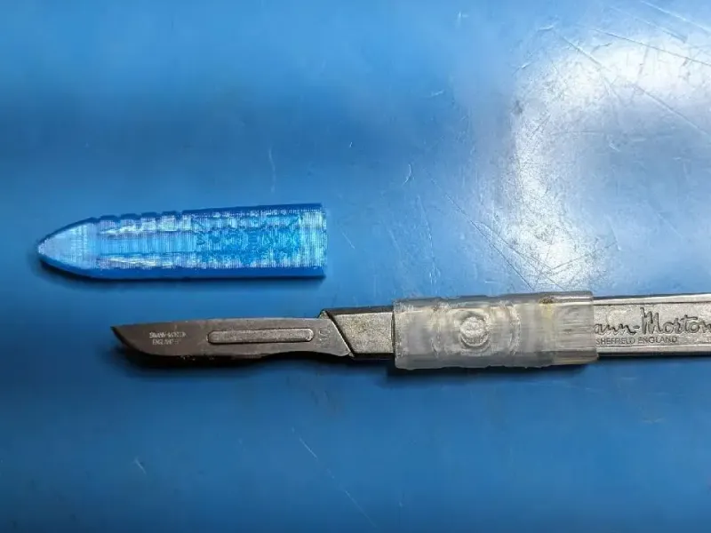 Scalpel blade sheath