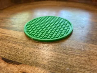 SPILL CATCHING COASTER