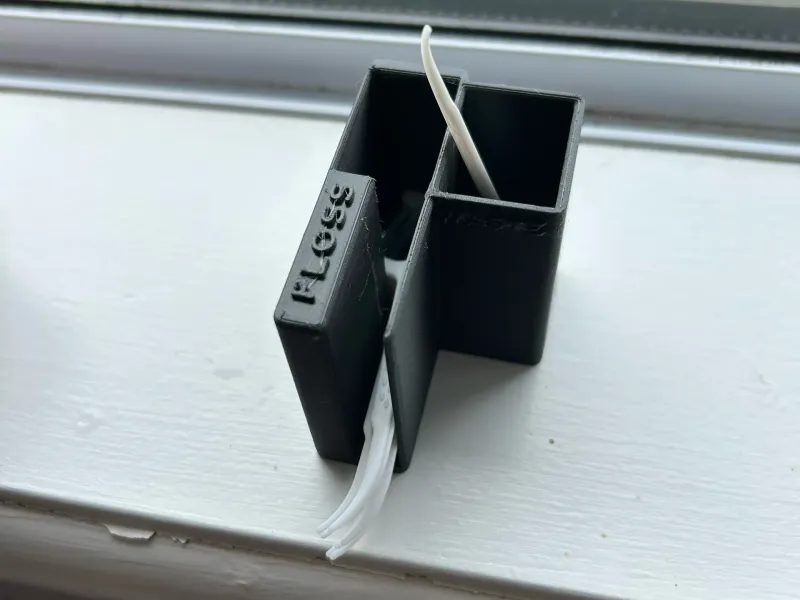 Oral B floss stick holder