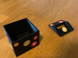 hollow cube box with a roof and a hole