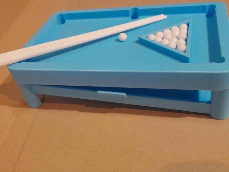 Sticks, balls and ball triangle to mini billiard