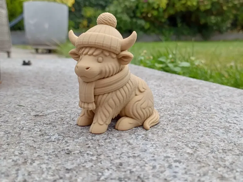 Cozy Cow — the Winter Highland Cow