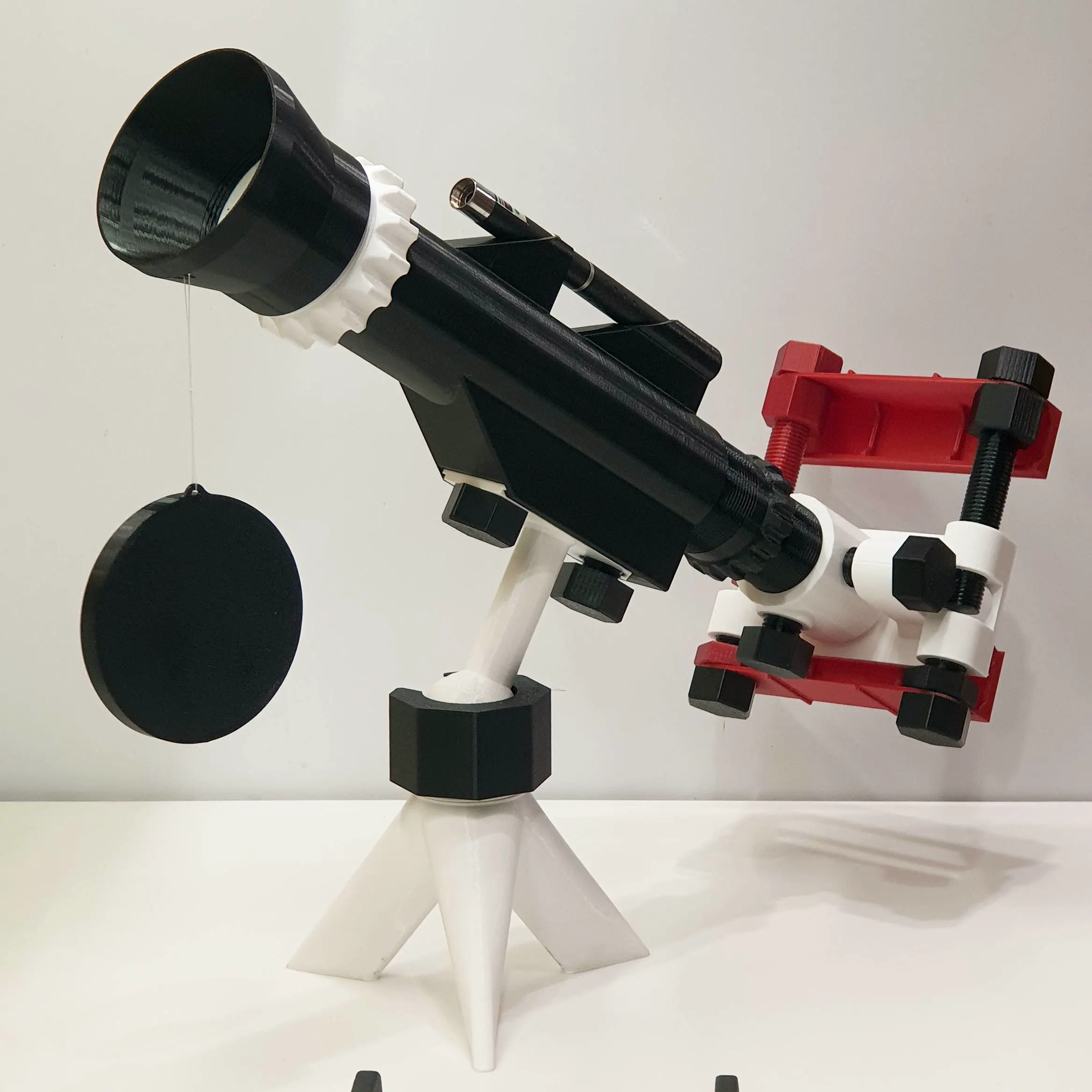 Telescope with laser and phone holder