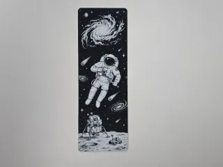Astronaut Space Exploration and Galaxy Bookmark