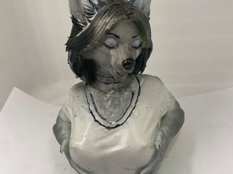 female wolf bust