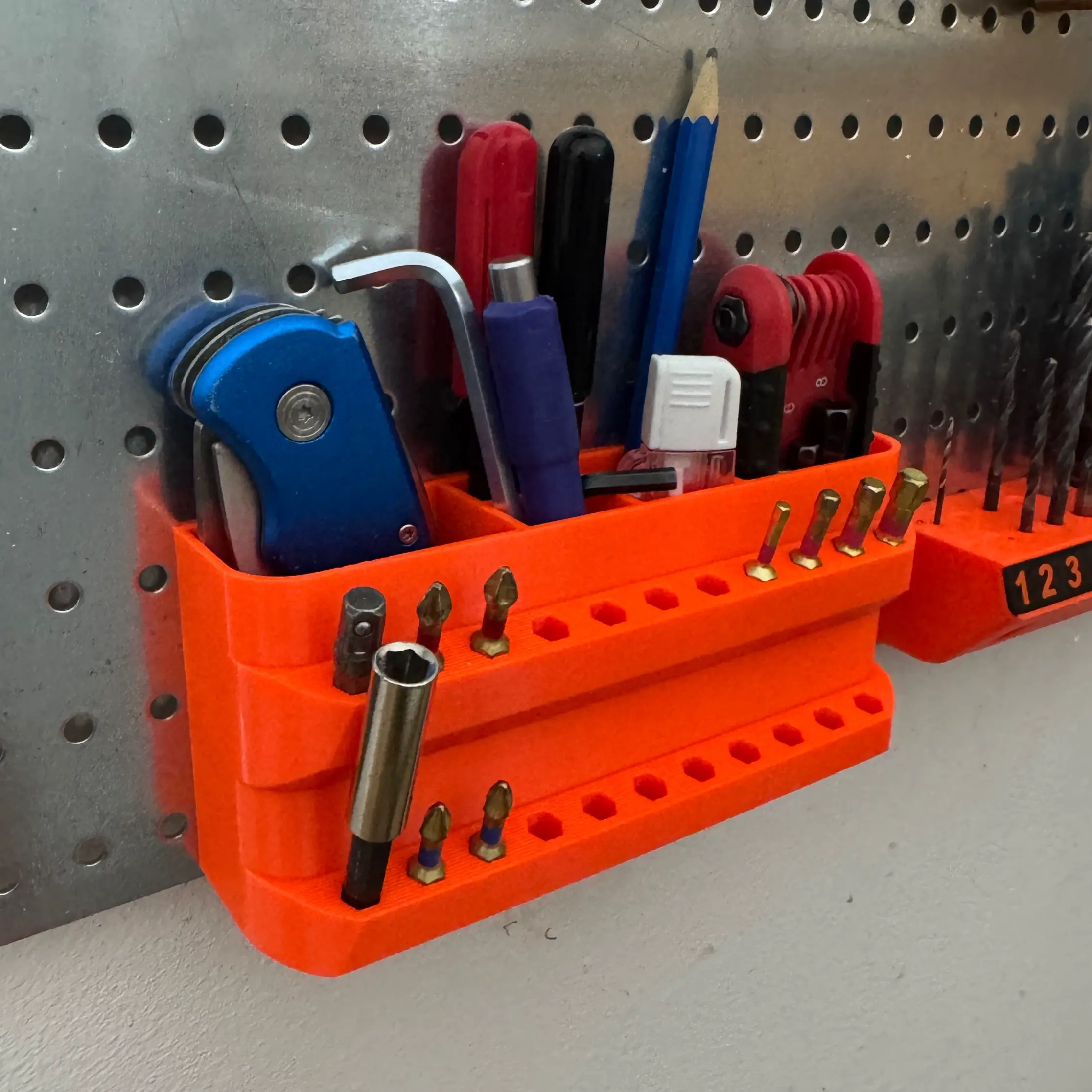 Wall organizer with drill bit holder
