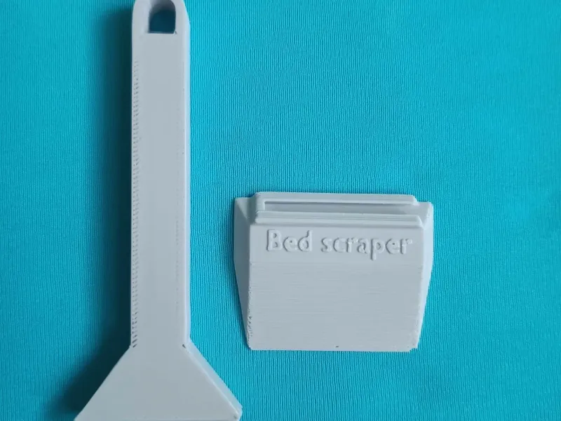 Two-piece bed scraper