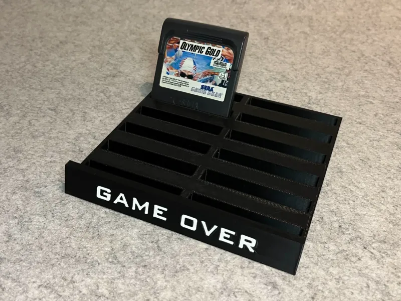Stand holder for Sega GameGear games
