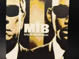 MANINBLACK1-1