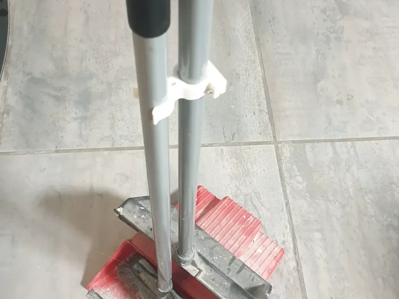 braçadeira para varredora de chão