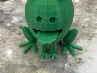 Frog with articulated tongue.