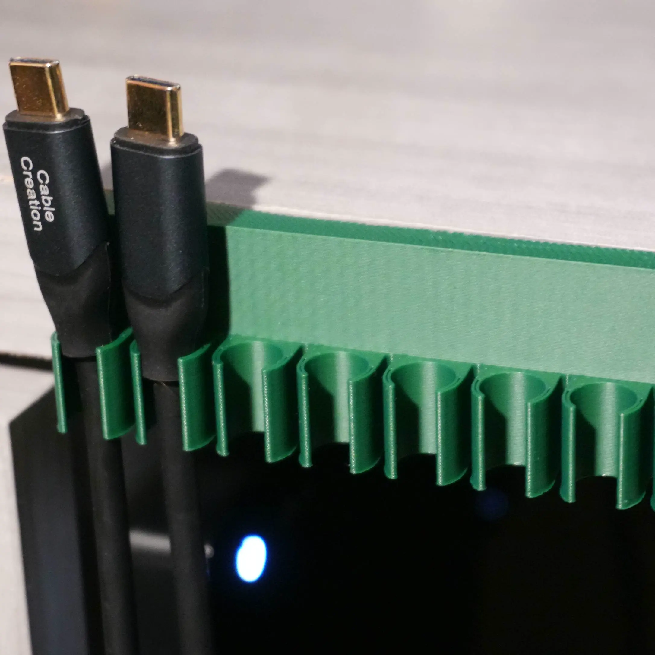 mountable 8-slot USB cable end holder / cable organizer