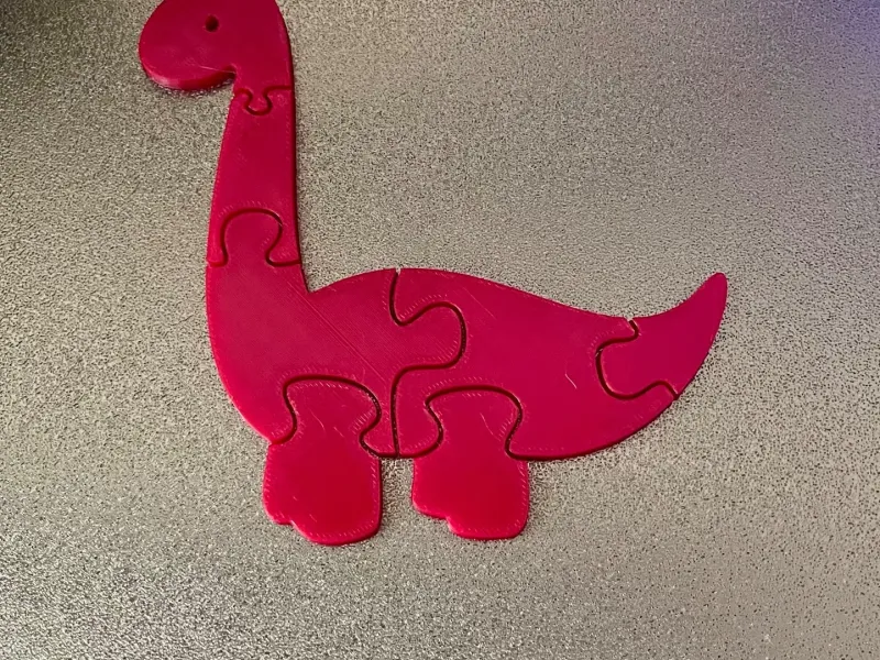 Puzzle di dinosauri per bambini - Stampa in un unico pezzo 1163973