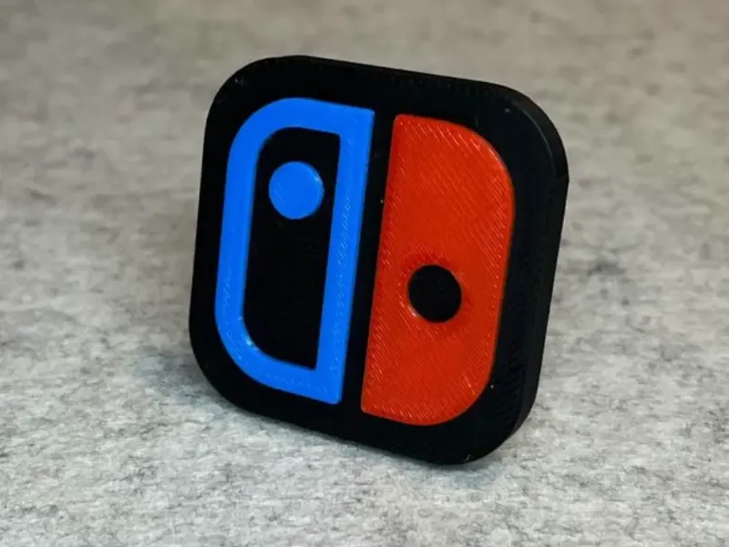 Soporte decorativo con logo para Nintendo Switch