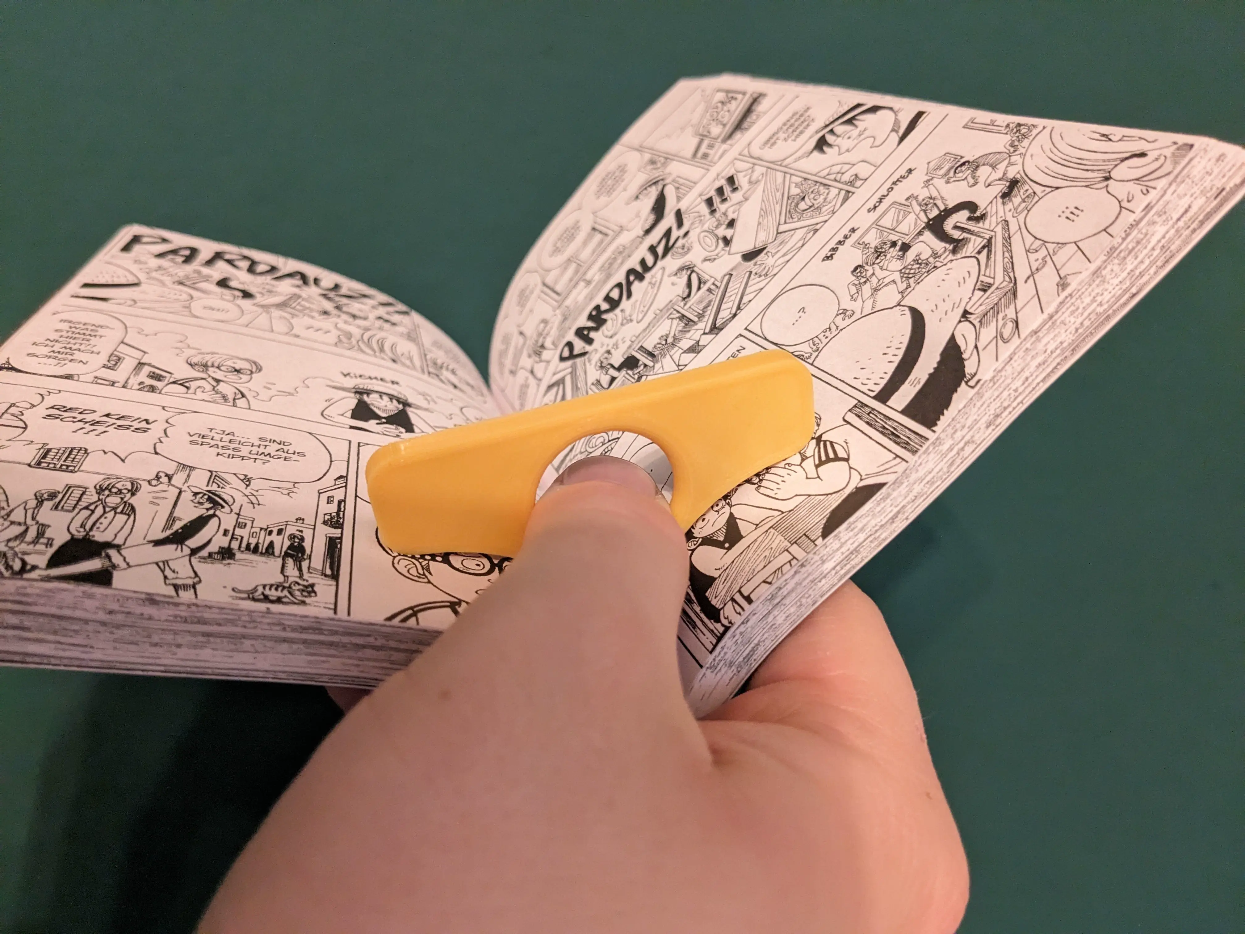 simple one hand book holder