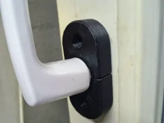 Cover for a plastic window handle