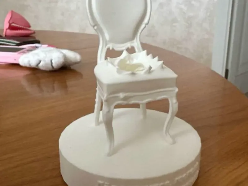 A miniature chair from the movie "12 Chairs"