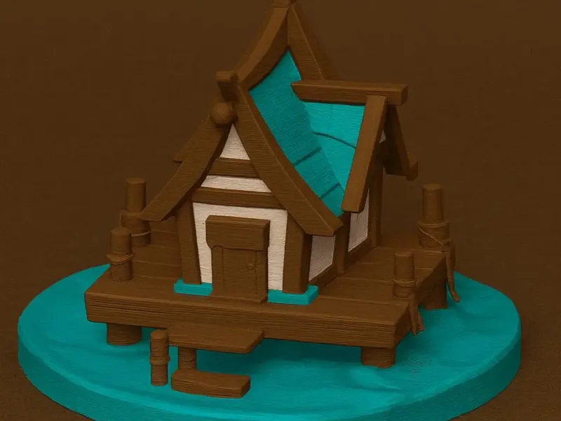 Figurine de maison au bord de l'eau