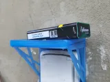 Power outlet protector and shelf 2in1-1