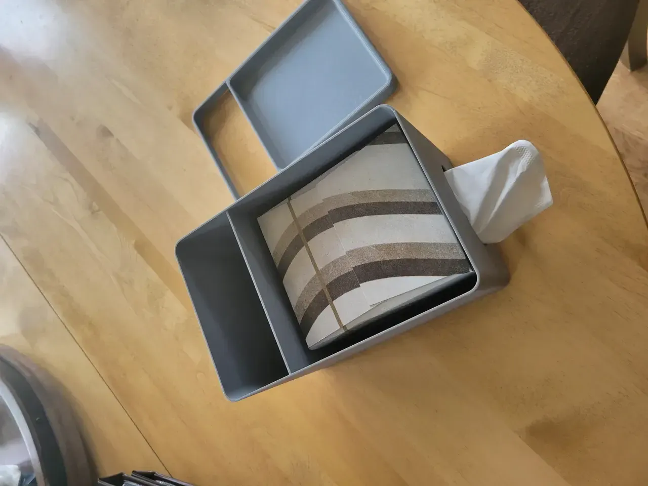 Tissue box cover organizer with remote storage

