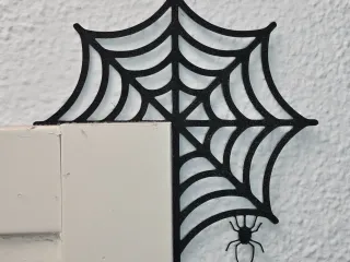 Spider web door topper corner