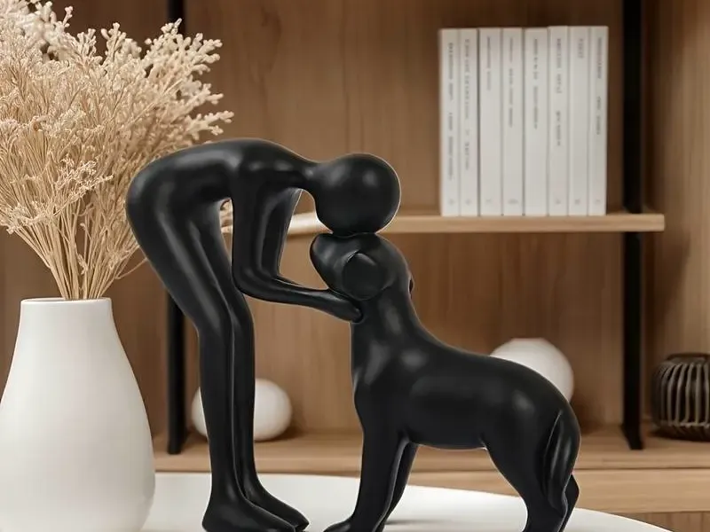 Dog & Owner Statue