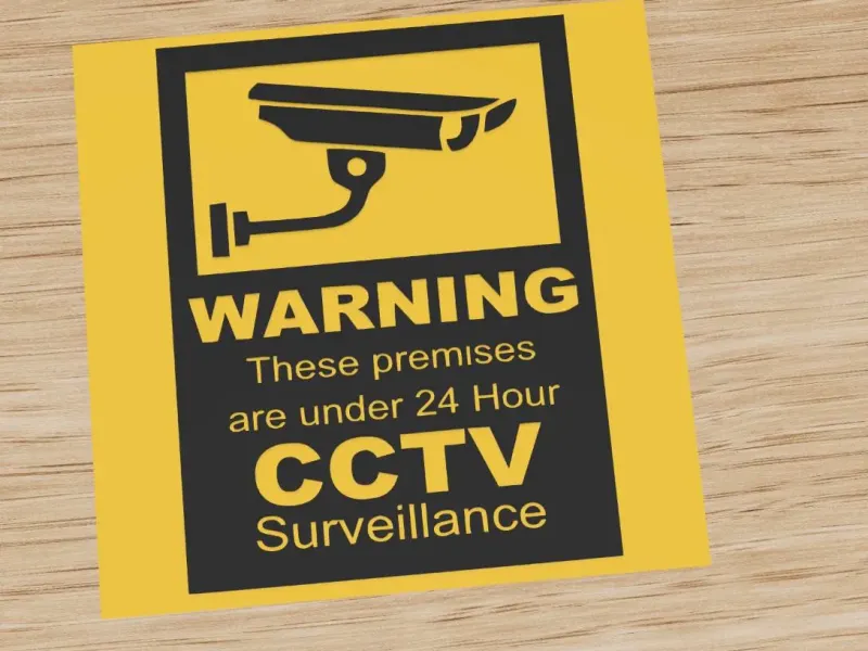 Warning sign for 24 hour CCTV surveillance