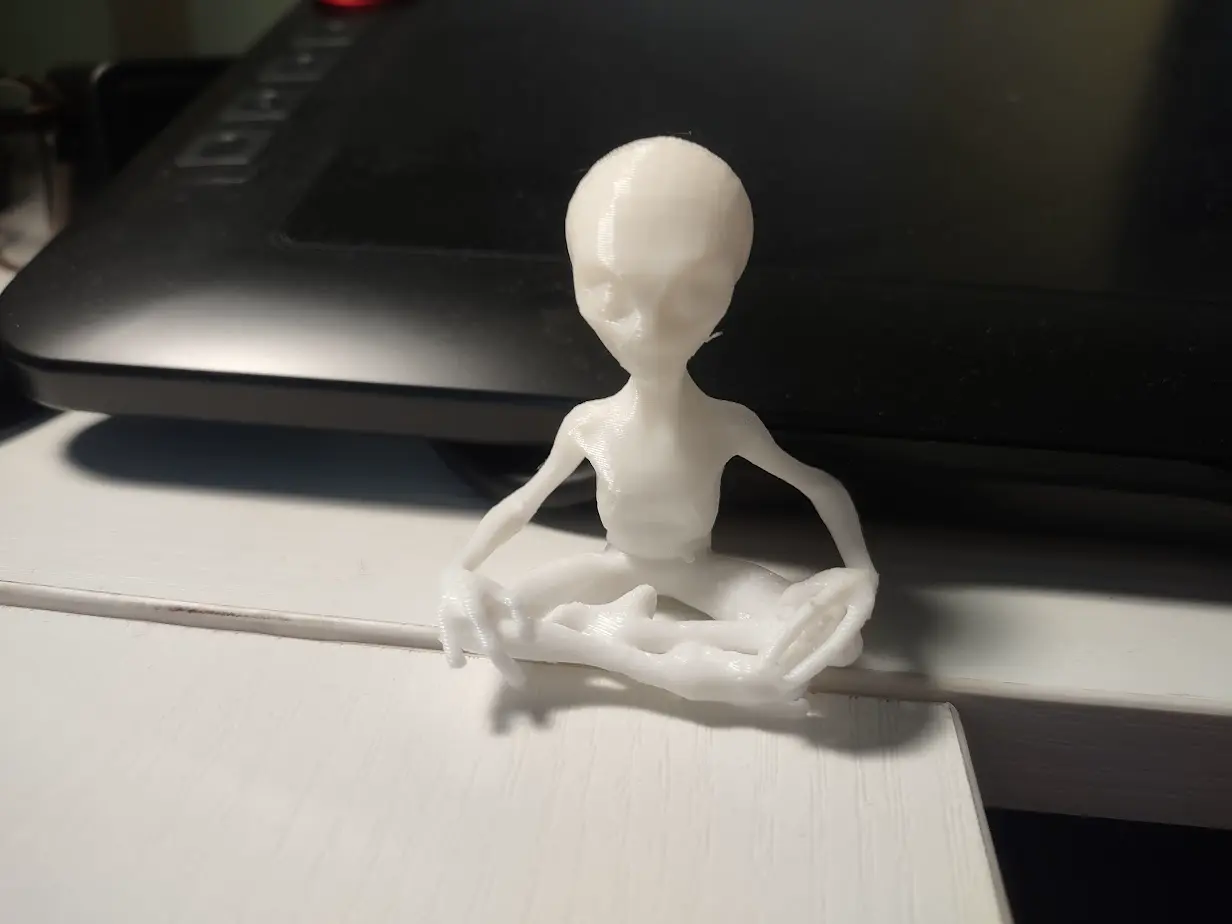 meditating alien