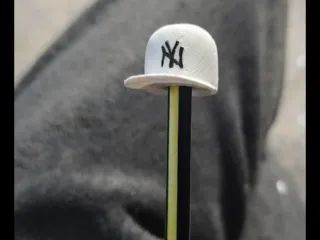 Cap pencil topper