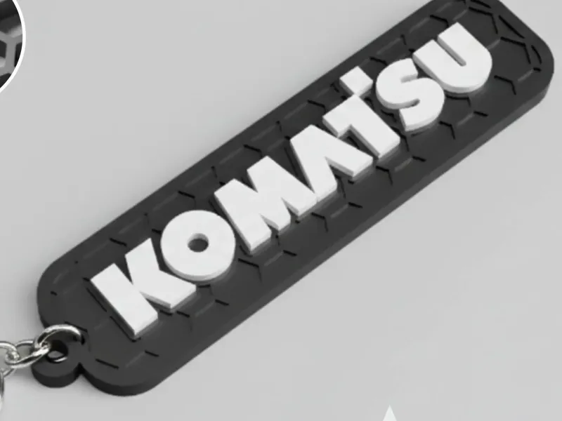 Komatsu-logo honingraatsleutelhanger