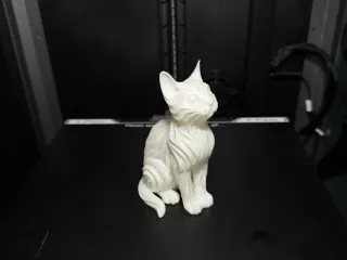 Wave‑Form Cat Figurine