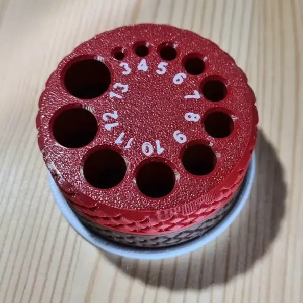 Recogedor de polvo para brocas