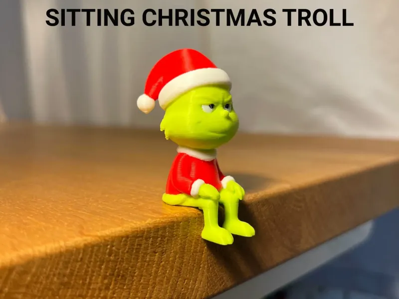 Сидящий рождественский тролль