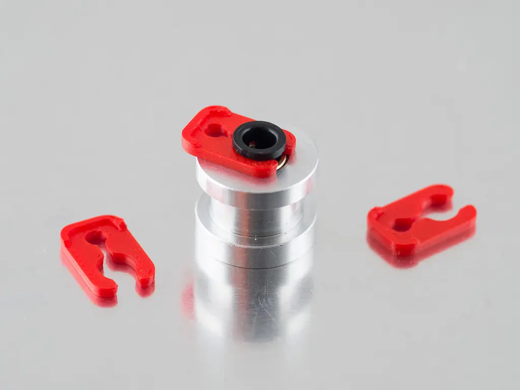 Pinza para tubo Bowden