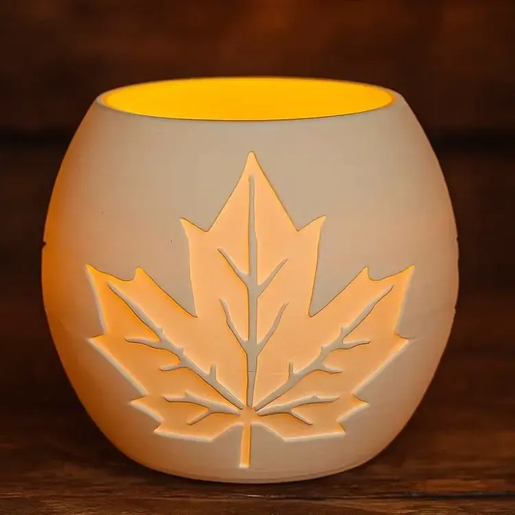 Vela de té con decoración otoñal
